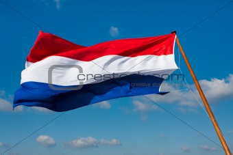 Flag of The Netherlands on pole