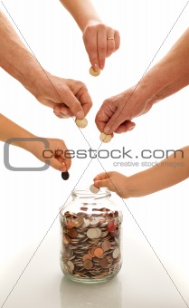 Hands of different generations saving coins