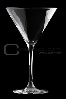 Martini glass isolated on a black background.