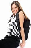 Pretty young woman with a backpack, smiles