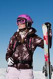 Girl skier with skis