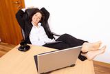 Young woman relaxing at work 