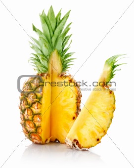 fresh pineapple with cut and green leaves