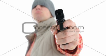 Young man is aiming with gun