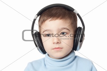 Thoughtful boy in headphones