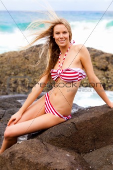 Attractive young Woman Wearing a Striped Bikini