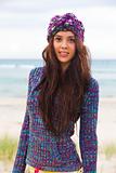 Attractive Young Woman Wearing a Sweater and Knit Cap