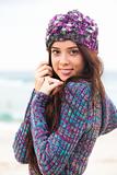 Attractive Young Woman Wearing a Sweater and Knit Cap