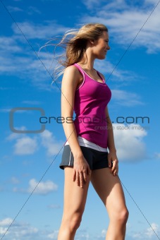Young Woman Standing in the Wind