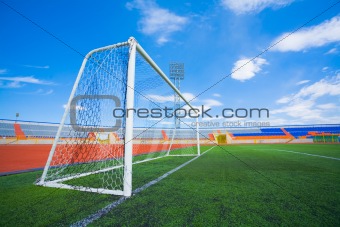 STADIUM - Football field with goal  on blue sky