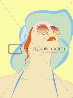 A woman wearing sunglasses and a hat in the sun