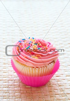 Vanilla cupcake with strawberry icing