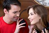 Young  couple with musical ear-phones