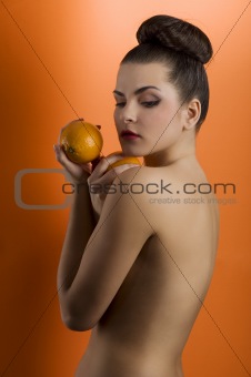 the orange fruit on color background