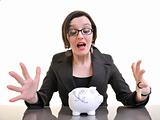 business woman putting money coins in piggy bank