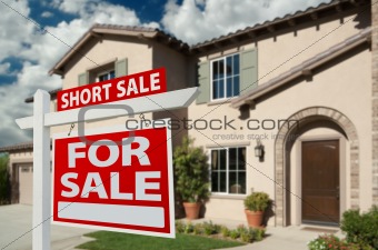 Red Short Sale Real Estate Sign and House.