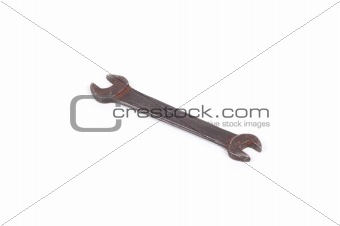 Old rusty wrench isolated on a white background shadow below.