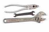 Wrench and flat-nose pliers isolated on a white background shado