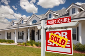 Sold Foreclosure Home For Sale Real Estate Sign in Front of New House -  Right Facing.