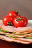 Tomatoes on ham slices