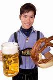 Happy man holds Oktoberfest beer stein (Mass) and Pretzel in han