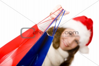 Young attractive smiling Santa Claus woman doing Christmas shopp