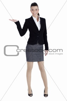 Full length of young woman pointing copysapce