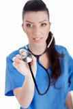 Blurred image of the nurse holding stethoscope 