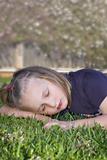 girl sleeping on the grass