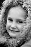 young girl in fluffy coat