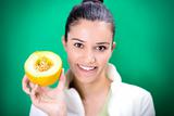 Smiling girl holding melon