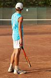 boy on tennis court