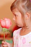 Little girl with rose