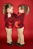 Female children twins dancing.