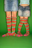 Girls wearing striped socks.