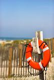 Life preserver on beach on Bald Head Island, North Carolina.