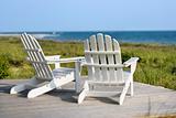 Adirondack chairs overlooking beach on Bald Head Island, North C
