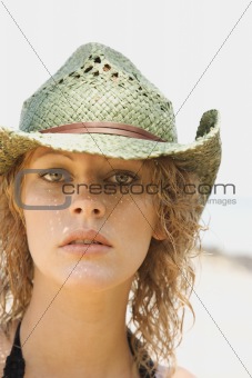 Young Caucasian adult female wearing cowboy hat.