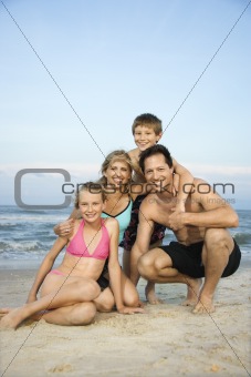 Portrait of family at beach.