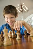 Boy playing chess.