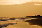 Golden beach at sunset.