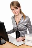 Business woman  in front of her desktop computer