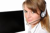   Customer Representative with headset smiling during a telephon