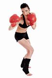 Woman doing boxing poses with red gloves