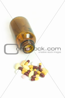 pills spill out from bottle