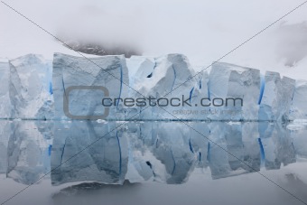 Glacier with reflections on water