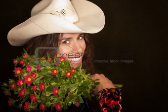 Pretty woman with flowers on green background