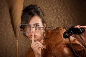 Beautiful Spy with Binoculars in Leather Coat