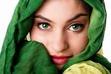 Face with green eyes and scarf
