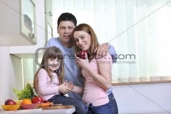 happy young family in kitchen